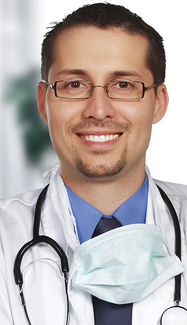 surgeon with mask and cap